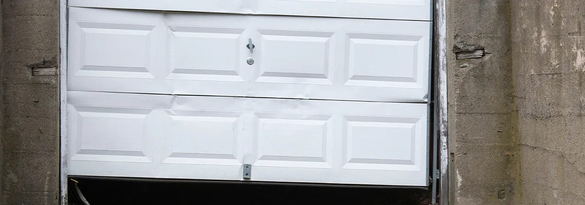 Garage Door Got Hit By A Car Dent Removal in Kanata, ON
