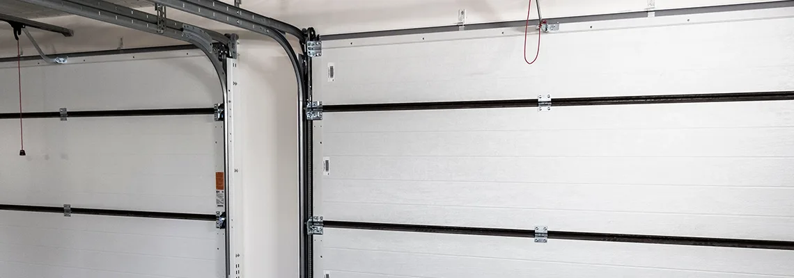 Fix Folding Garage Door Jerking in Kanata, Ontario