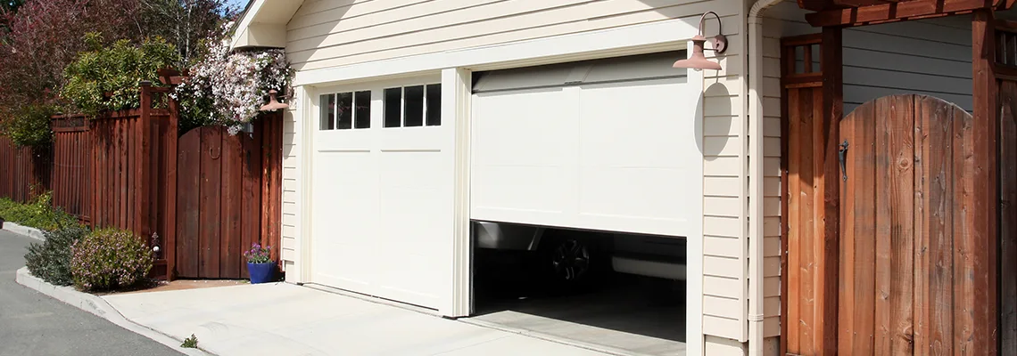Fix Metal Garage Door Jerking in Kanata, Ontario